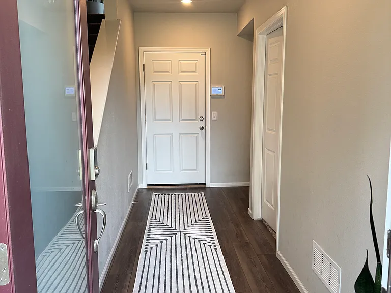 Entry hall with coat closet to the left