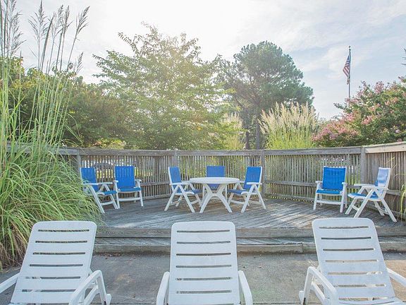 Enjoy time with family and friends on our poolside sundeck.