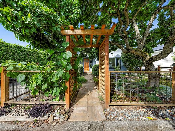 Lush gardens provide shade and privacy>