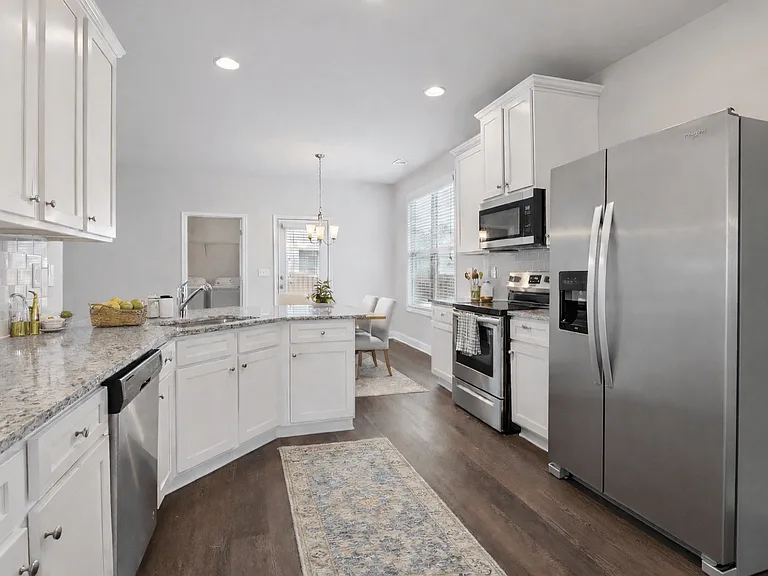 Another view of the spacious kitchen