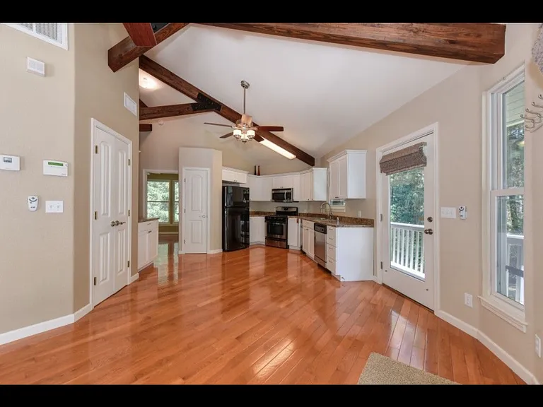 Living room looking into kitchen area