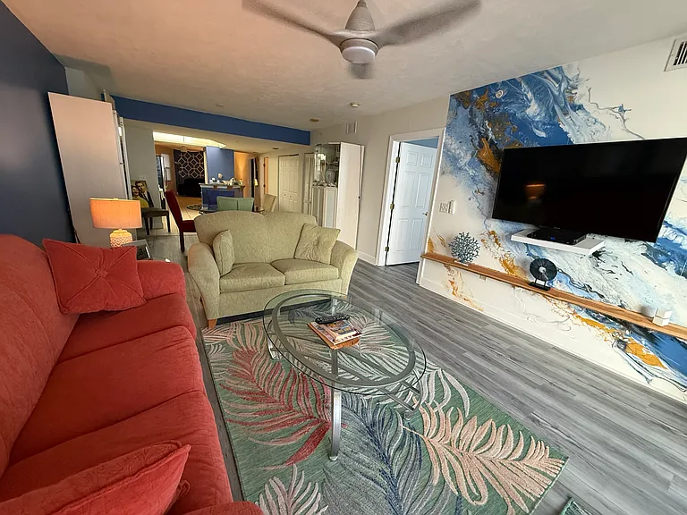 Living room with the Ocean Waves Crashing over your Lage Smart TV