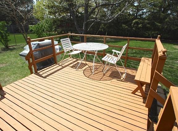 Nice sunny deck with just a step down to yard. Perfect for grilling with access right off kitchen.
