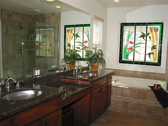 Master Bath w/double vanity, lg. tub frameless shower, walk-in closet