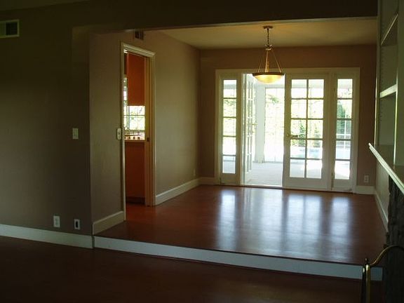 Formal Dining Room Leads to HUGE Sunroom