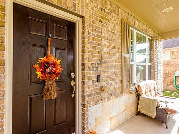 Elevation is complete with this welcoming front porch.