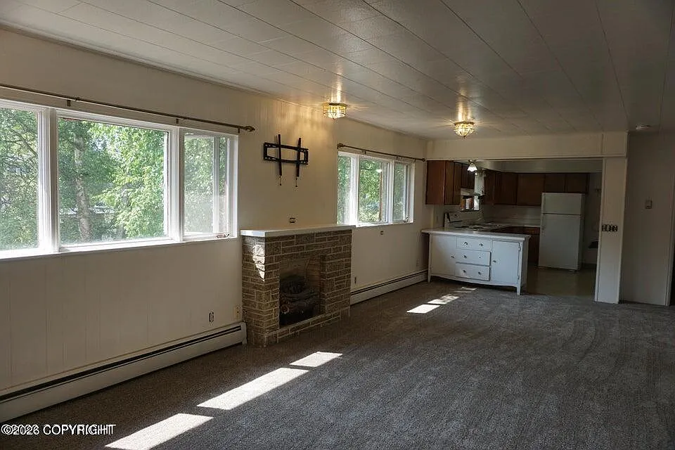 Building Photo - 1205 W 47th Ave #2