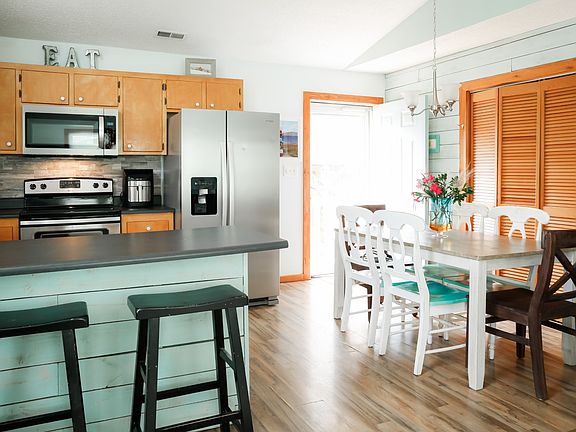 Eat In Kitchen, Breakfast Bar, Closet to Laundry Area