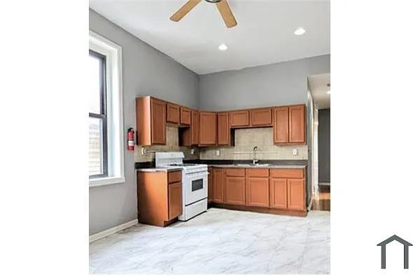 Building Photo - 1302 S Spaulding Ave #2