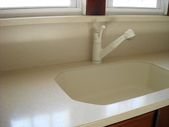 Close Up of the Corian Countertop in Kitchen