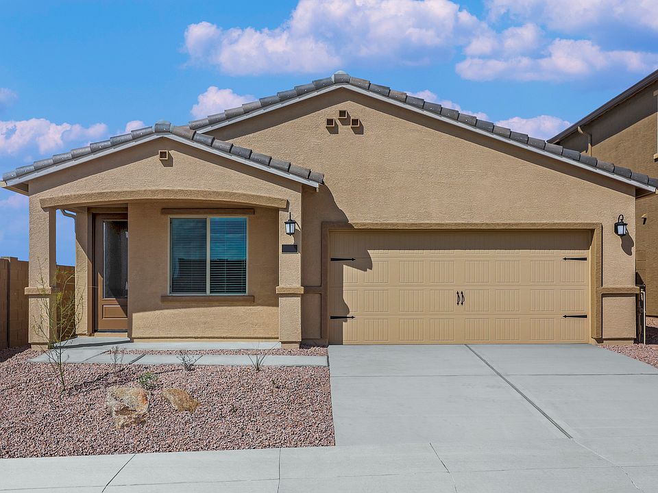 Exterior of the Prescott with desert landscaping and a two-car garage.