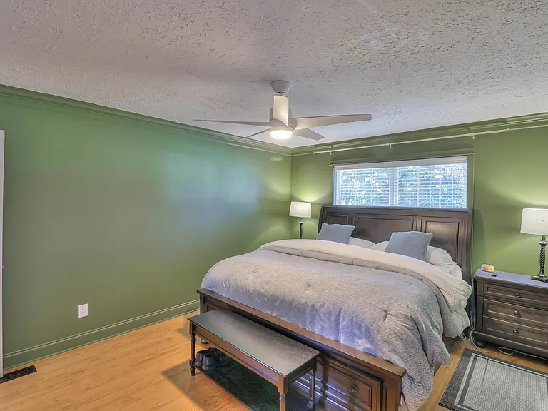 Primary Bedroom - Has recently been painted a lighter color. Updated photos coming.