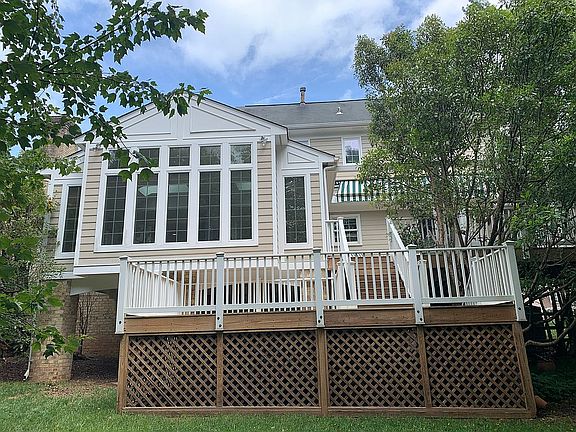 Rear sunroom and lower deck