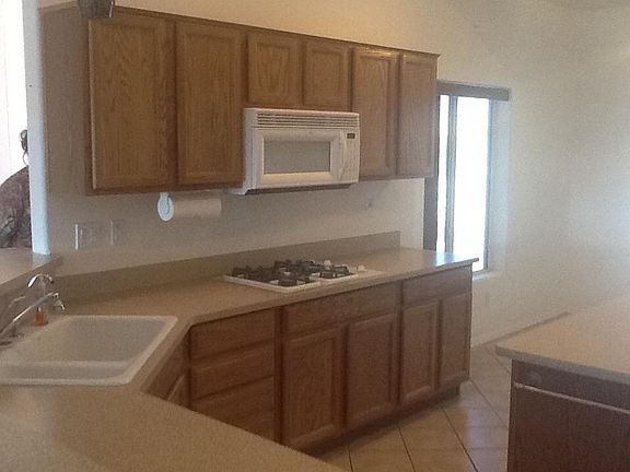 Eat in kitchen with built-ins and a microwave