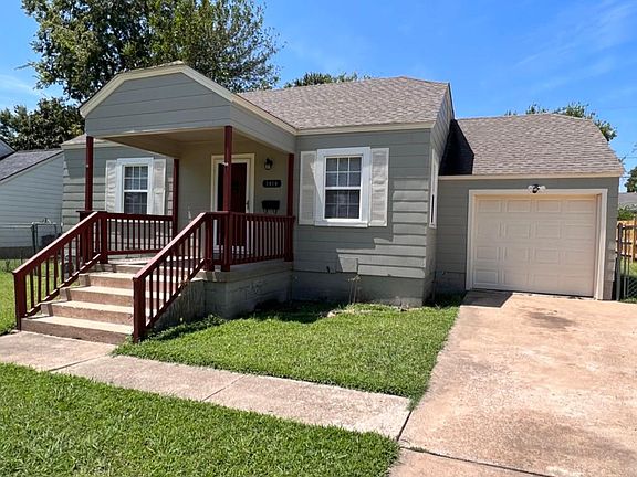 Front Elevation as viewed from driveway. New exterior paint and staining on handrails.