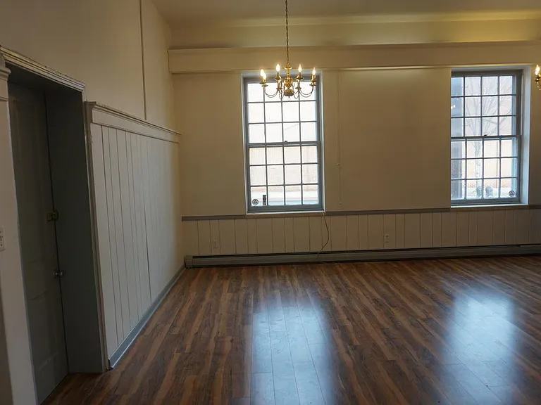 Front door on left, great room, kitchen area is on the right.