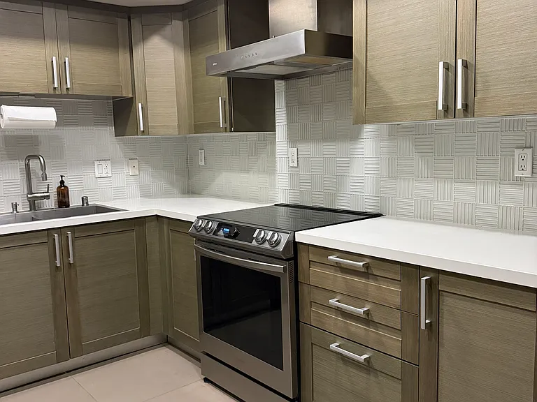 Other side of kitchen with new Samsung induction range with Smart oven