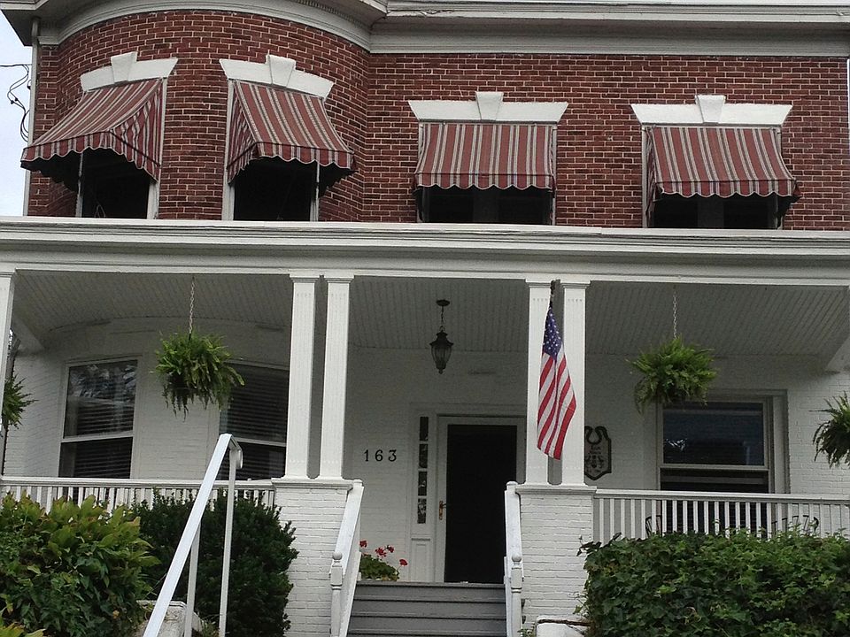 Front view, with awnings.