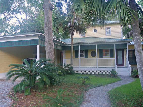 Front view with carport.