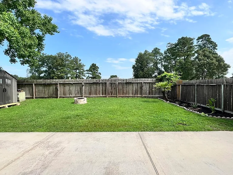 Huge backyard patio added, for plenty of outdoor furniture.
