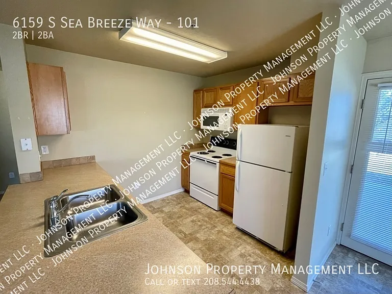 6159 S Sea Breeze Way #101 — Photo 5