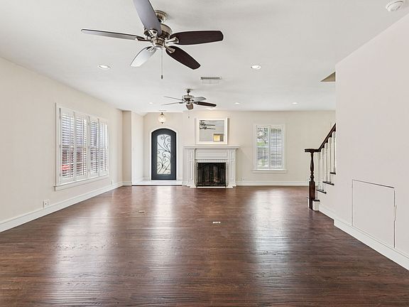 this is the living room taken from the far wall from the front door which you can see is black