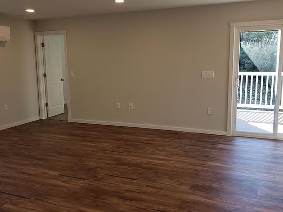 living room and slider to private deck