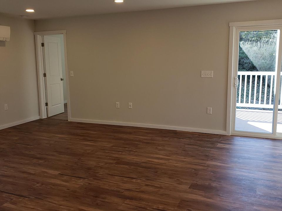 living room and slider to private deck