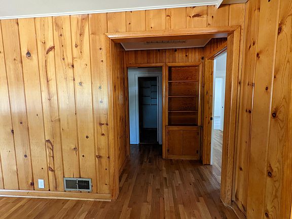 Hallway with built-in shelving