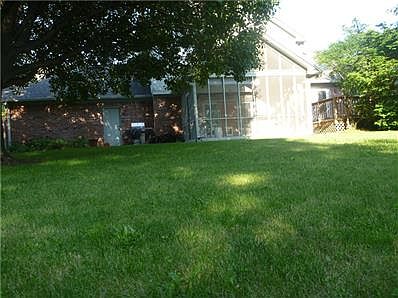 Back with Screened porch and deck