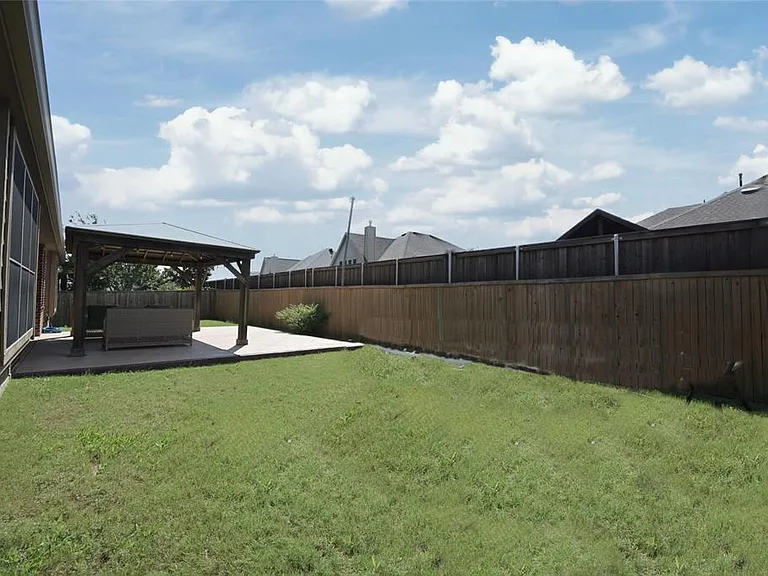 6 ft stained privacy fenced backyard