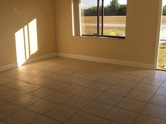 brand new tile ( living room,dining,kitchen, bath