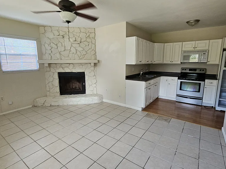 The dining room and kitchen.