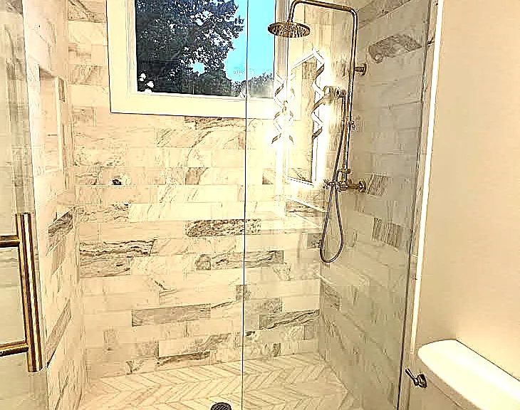 Common bath with Luxury - marble shower and glass doors