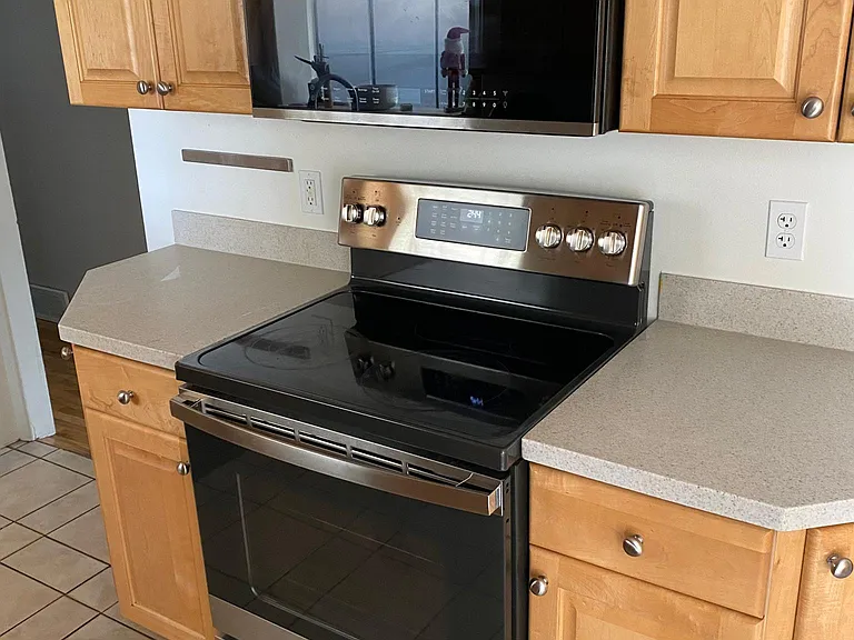 Kitchen area with New range and oven