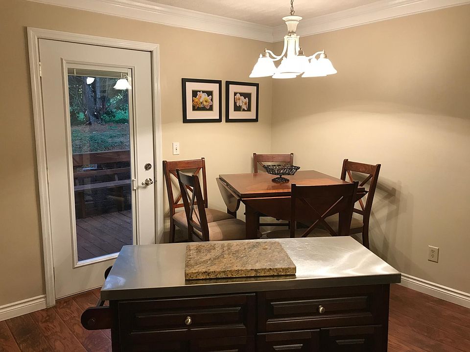 Kitchen with exit door to outside back deck