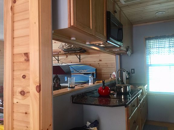 Galley kitchen open to LR