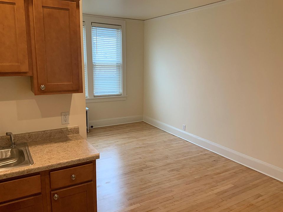 View from kitchen into living room. Shows new blinds.