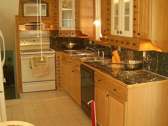 kitchen viewing from dining area (tile floor)