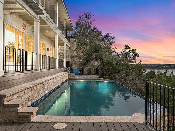 Huge decks overlooking pool and lake
