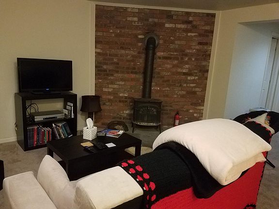 Basement with woodburning stove