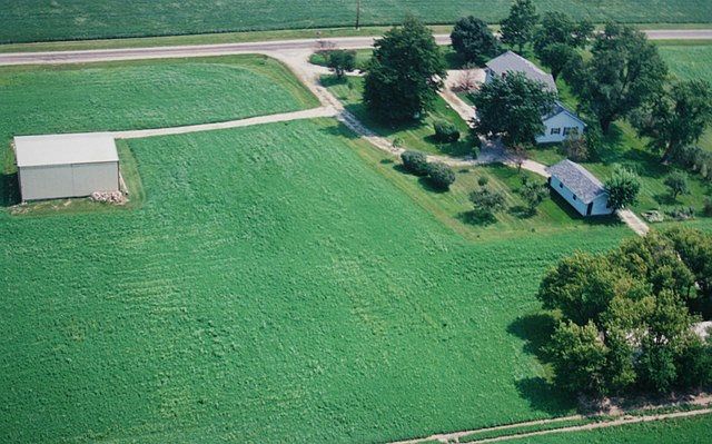 Aerial View...Does not Show the 170' x 16" Outbuilding! 4 Acres leased for Crops