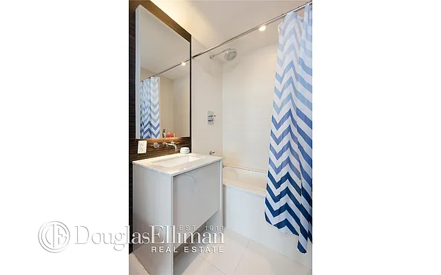 Sold by Douglas Elliman | media 9