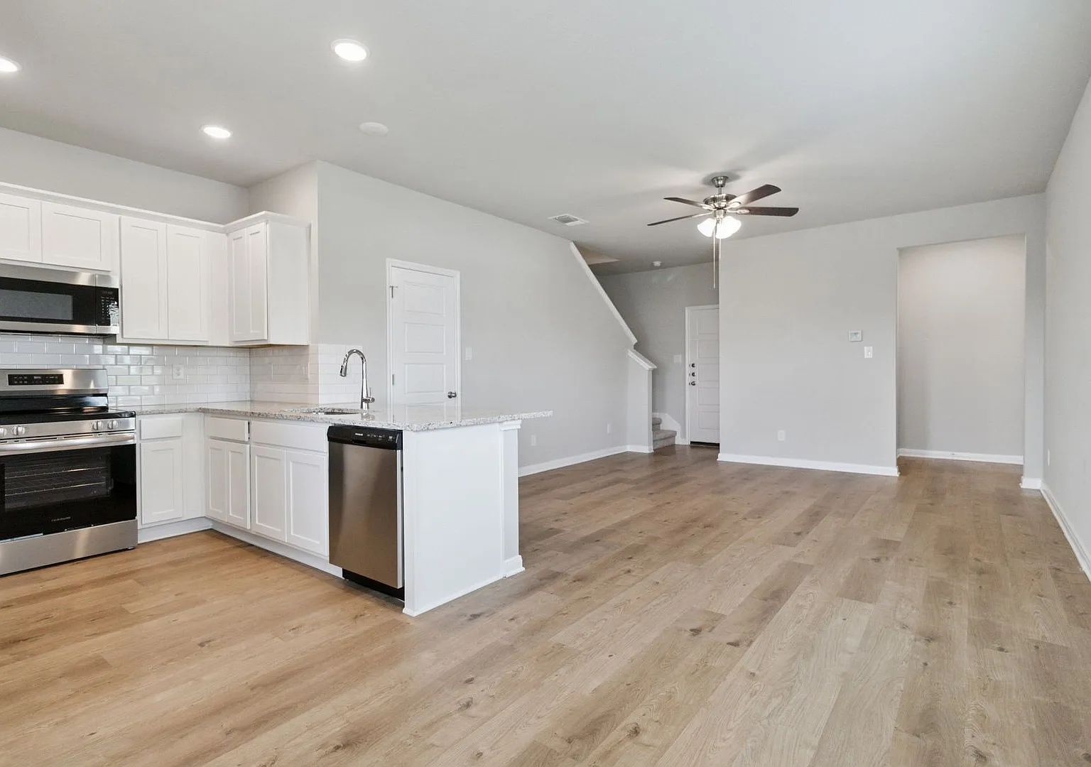 Brand-New 3-Bedroom Emma Park Townhome with Private Yard & 2-Car Garage — Photo 4