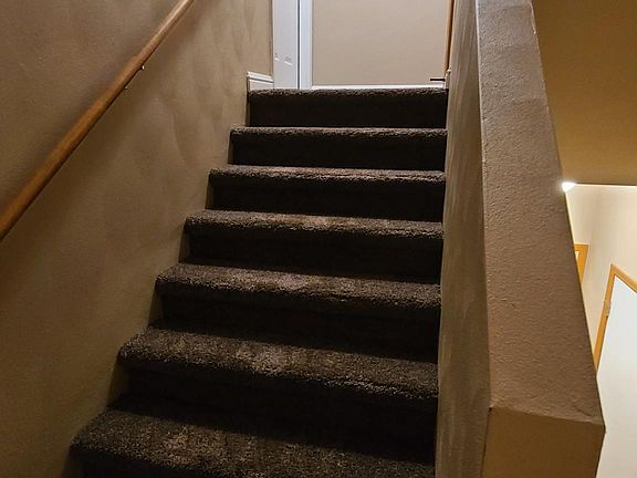Private stairs to upper level unit