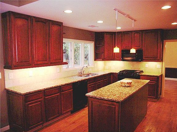 Granite counters, and everything else you'd expect in a new kitchen