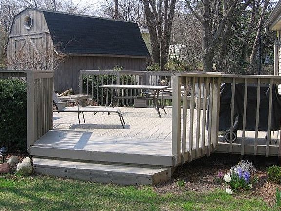 backyard deck with shed