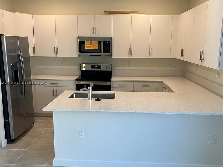 11447 W 34th Ct — Photo 18