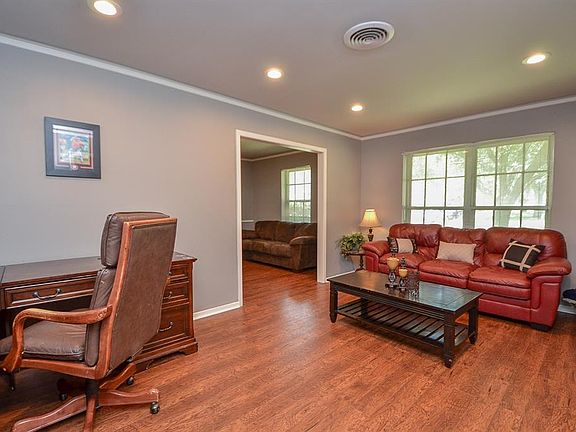 Formal Living Room adjacent to Formal Dining Room