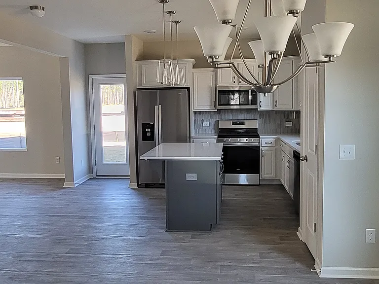 View of dining and kitchen open concept